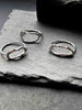 Textured silver rings with organic, wavy openwork designs. Oval molten texture silver rings.