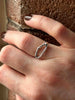 Textured silver ring with organic, wavy openwork designs. Oval molten texture silver ring.